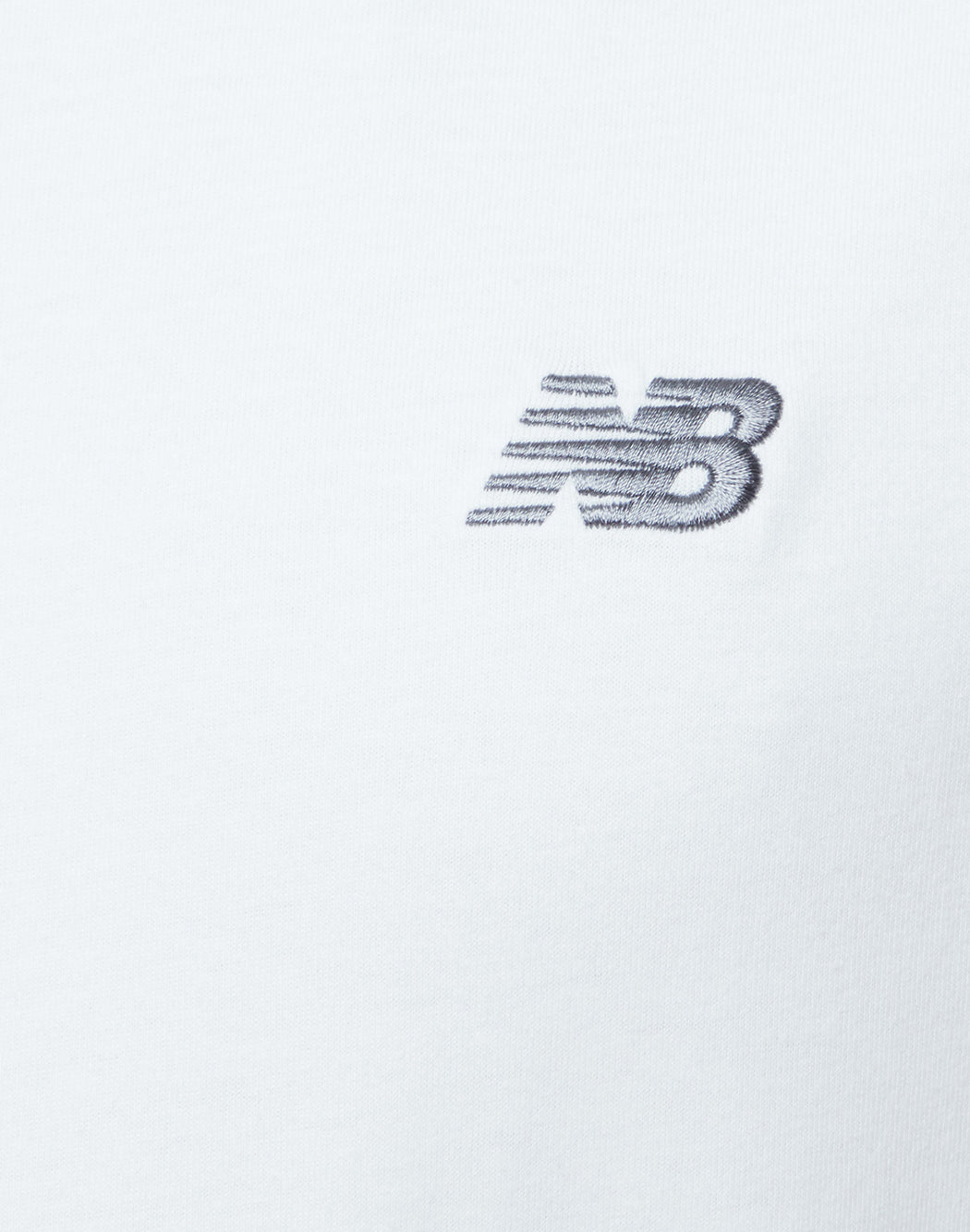 New Balance T-SHIRT CON MINI LOGO FRONTALE Bianco